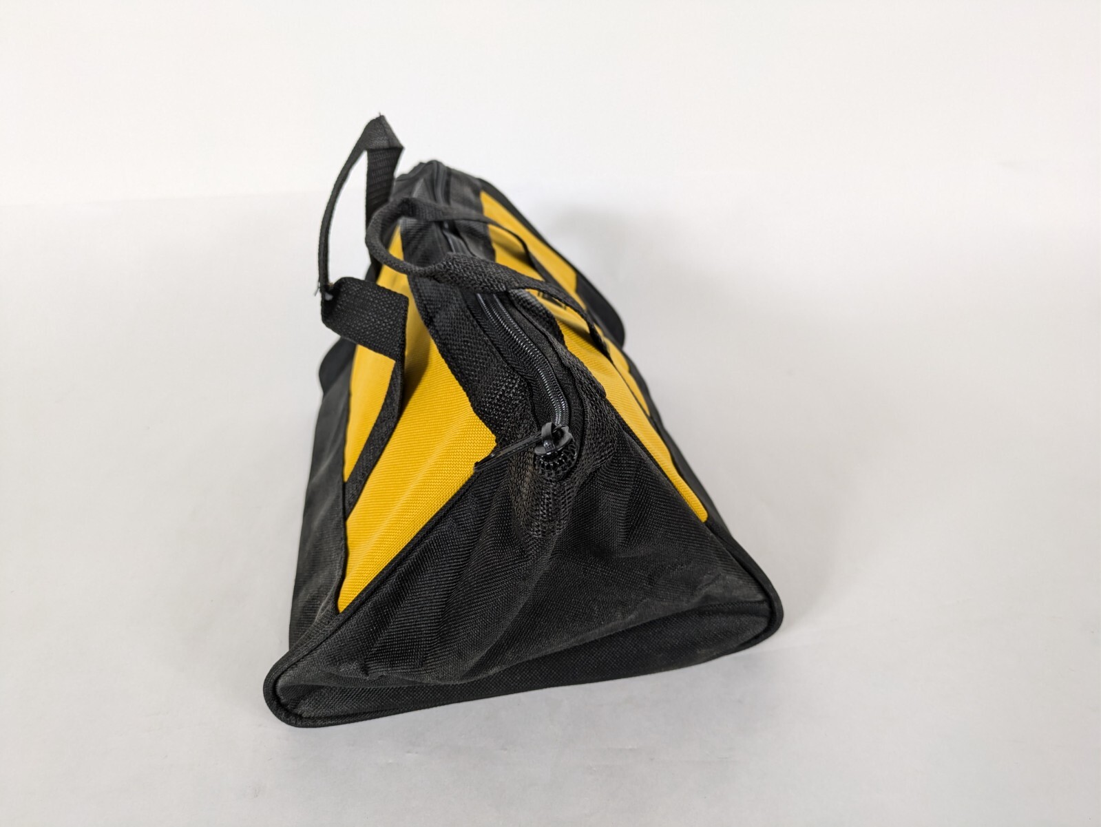 Small DeWalt Branded Tool Bag/ 11x9x7 inches tall/ triangular profile/ zipper