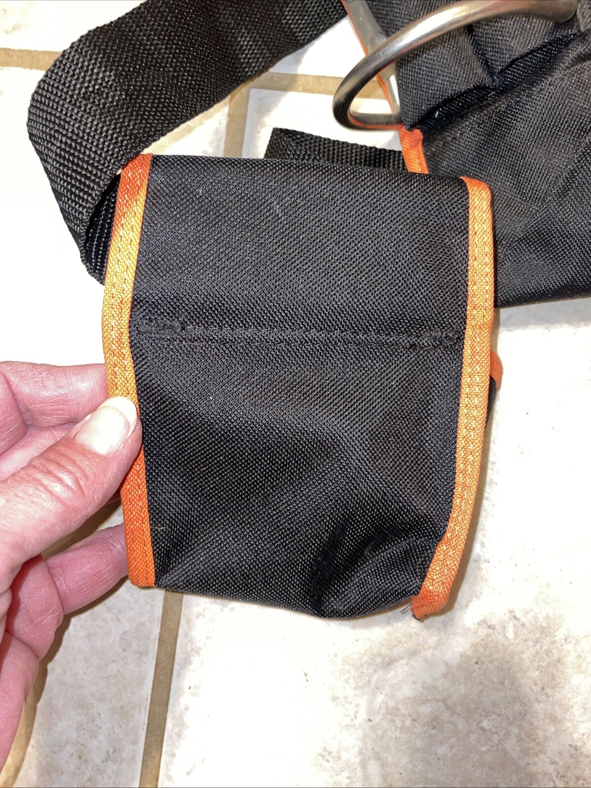 Black and orange removable tool belt with Tape Measure Pocket