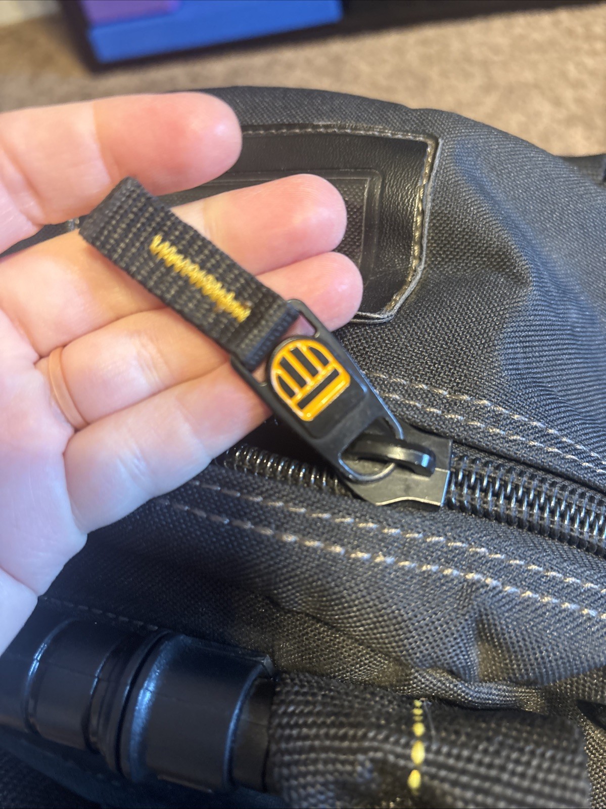 DEWALT DGL523 57 Pocket Lighted Tool Backpack – Black/Yellow