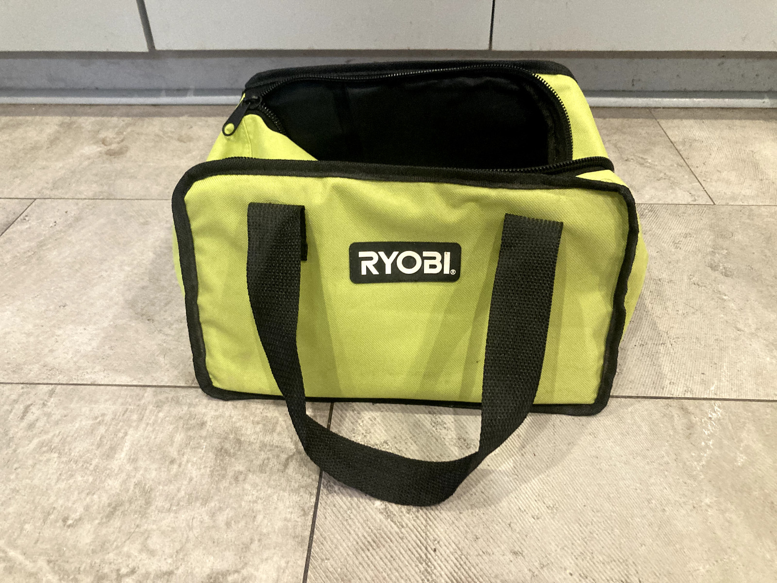 RYOBI Yellow-Green Tool Bag with Black Straps and Zipper Opening on Top 12×9.5in