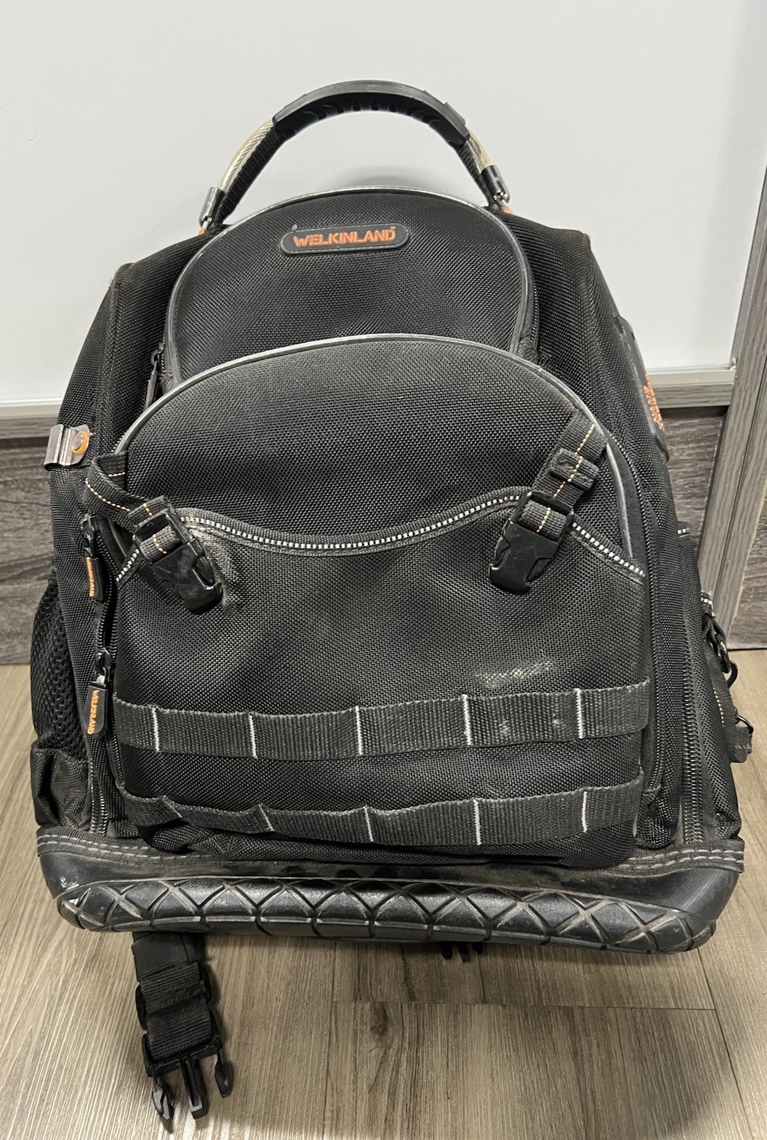 WELKINLAND 77 Pocket Large Tool Backpack Black/Orange Molded Base, Padded Handle