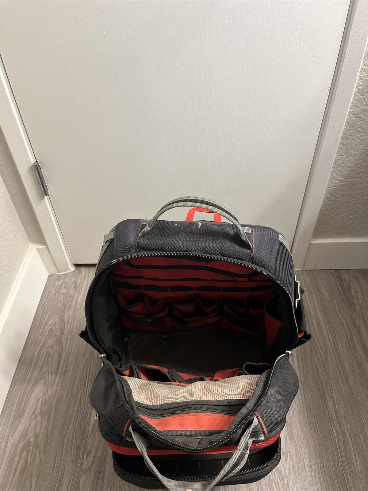Milwaukee 48-22-8201 48-Pocket Hard Molded Ultimate Jobsite Backpack, Black/Red