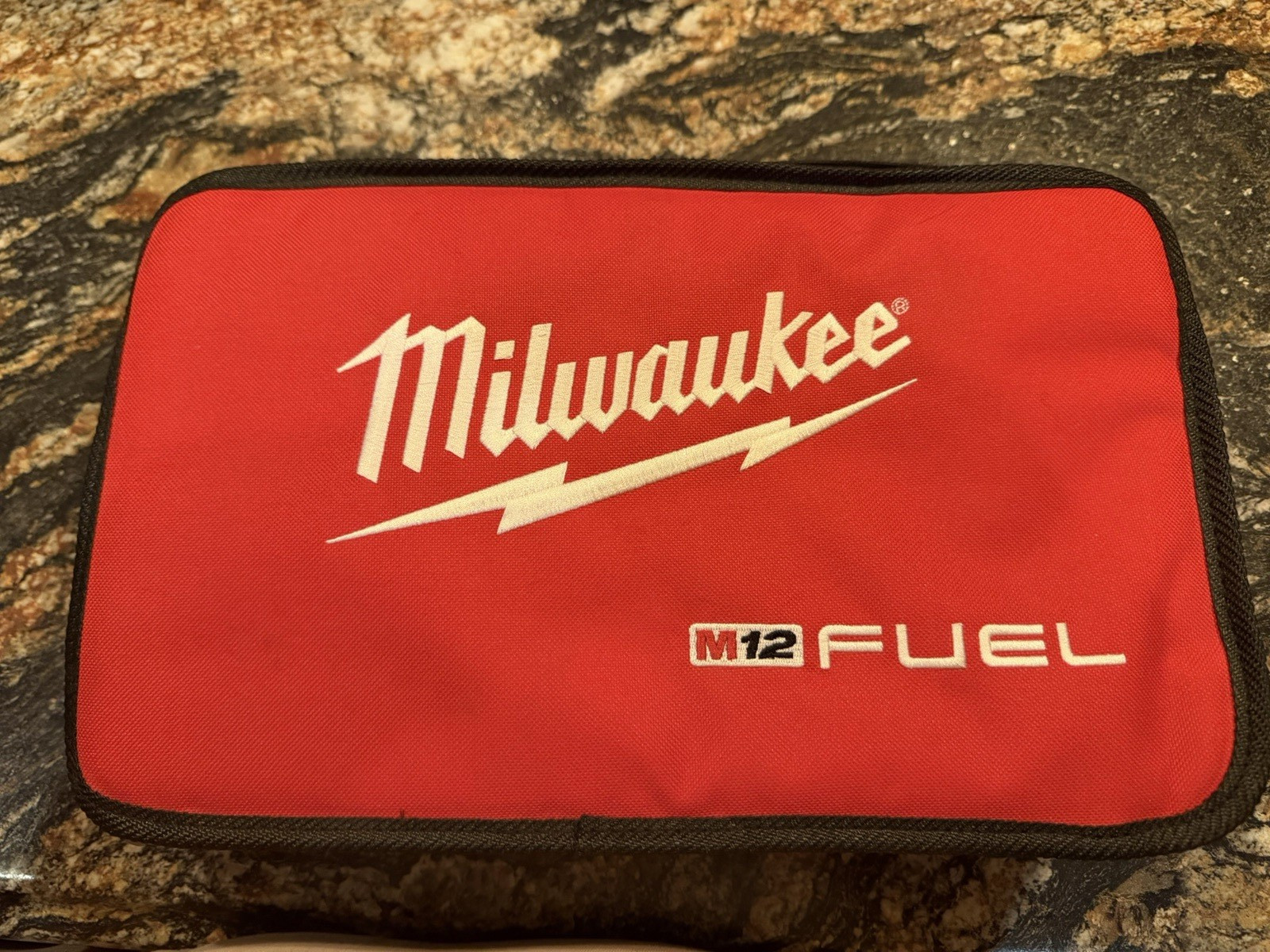 Milwaukee M12 FUEL Small Tool Bag Red/Black Zipper, Handle, Mesh 48-22-8122