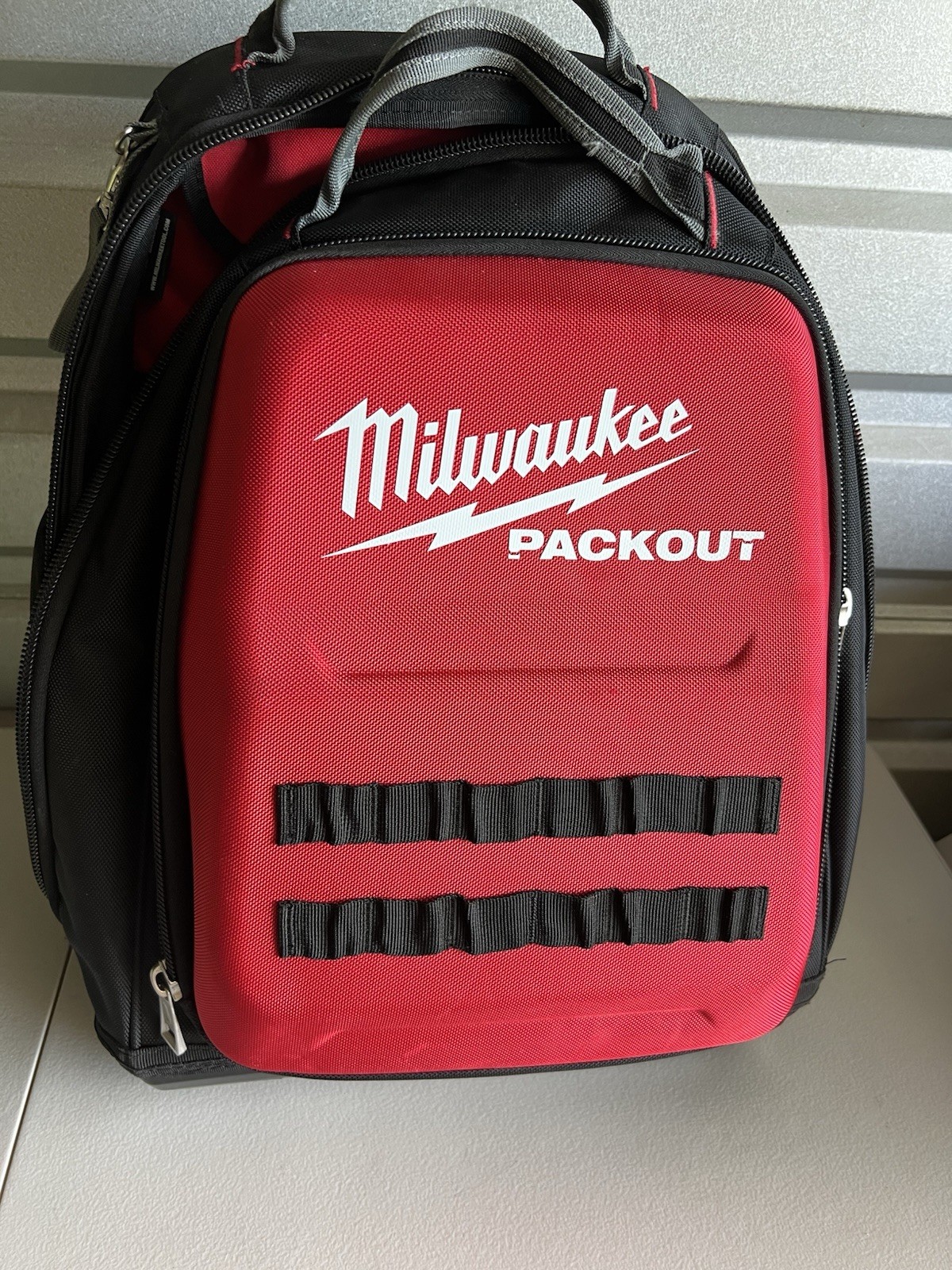 Milwaukee 48-Pocket Tear-Resistant PACKOUT Modular Storage Backpack NEEDS REPAIR