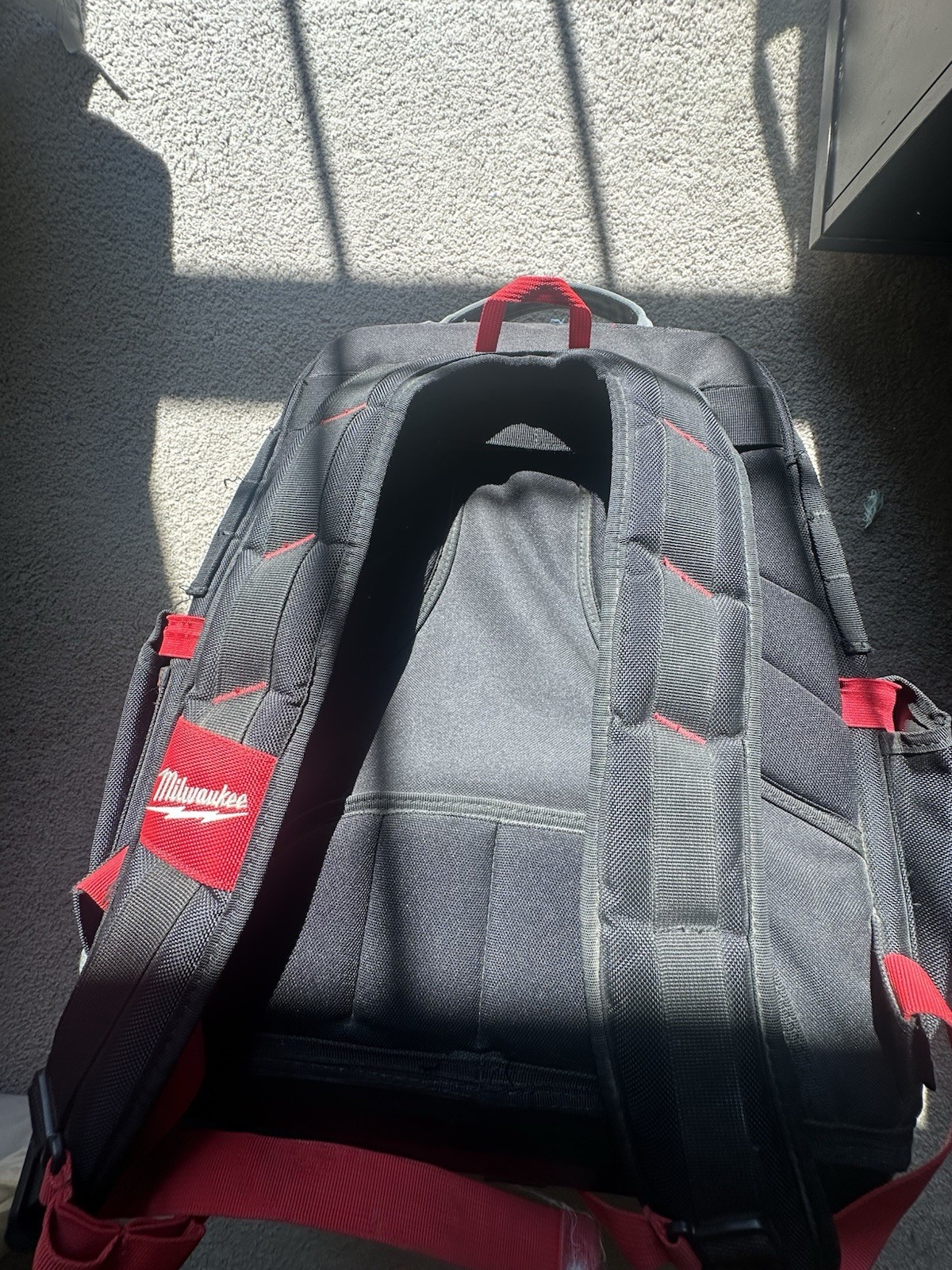 Milwaukee Packout Backpack 15″ Heavy-Duty Zippers, Reinforced Side Walls, Red