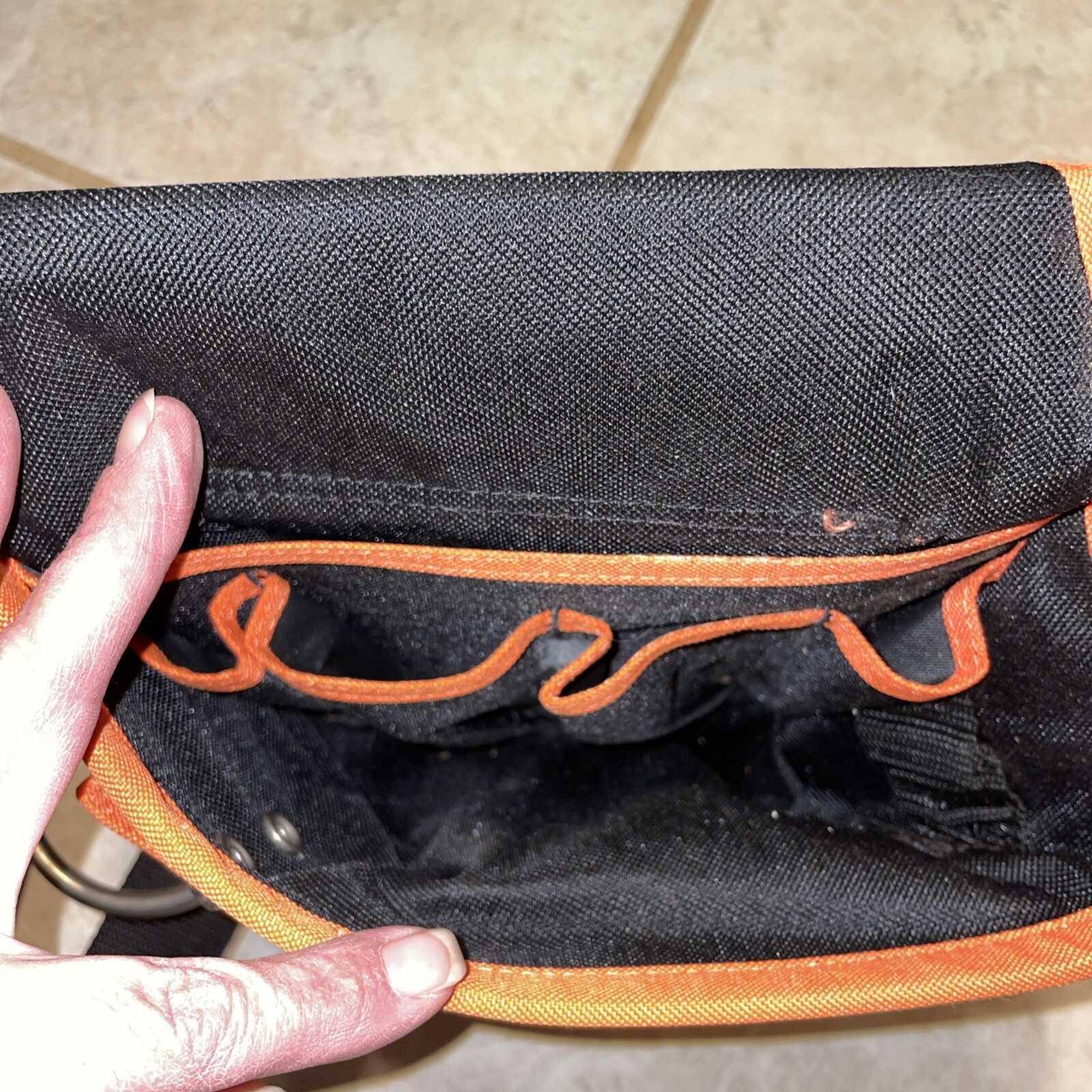 Black and orange removable tool belt with Tape Measure Pocket