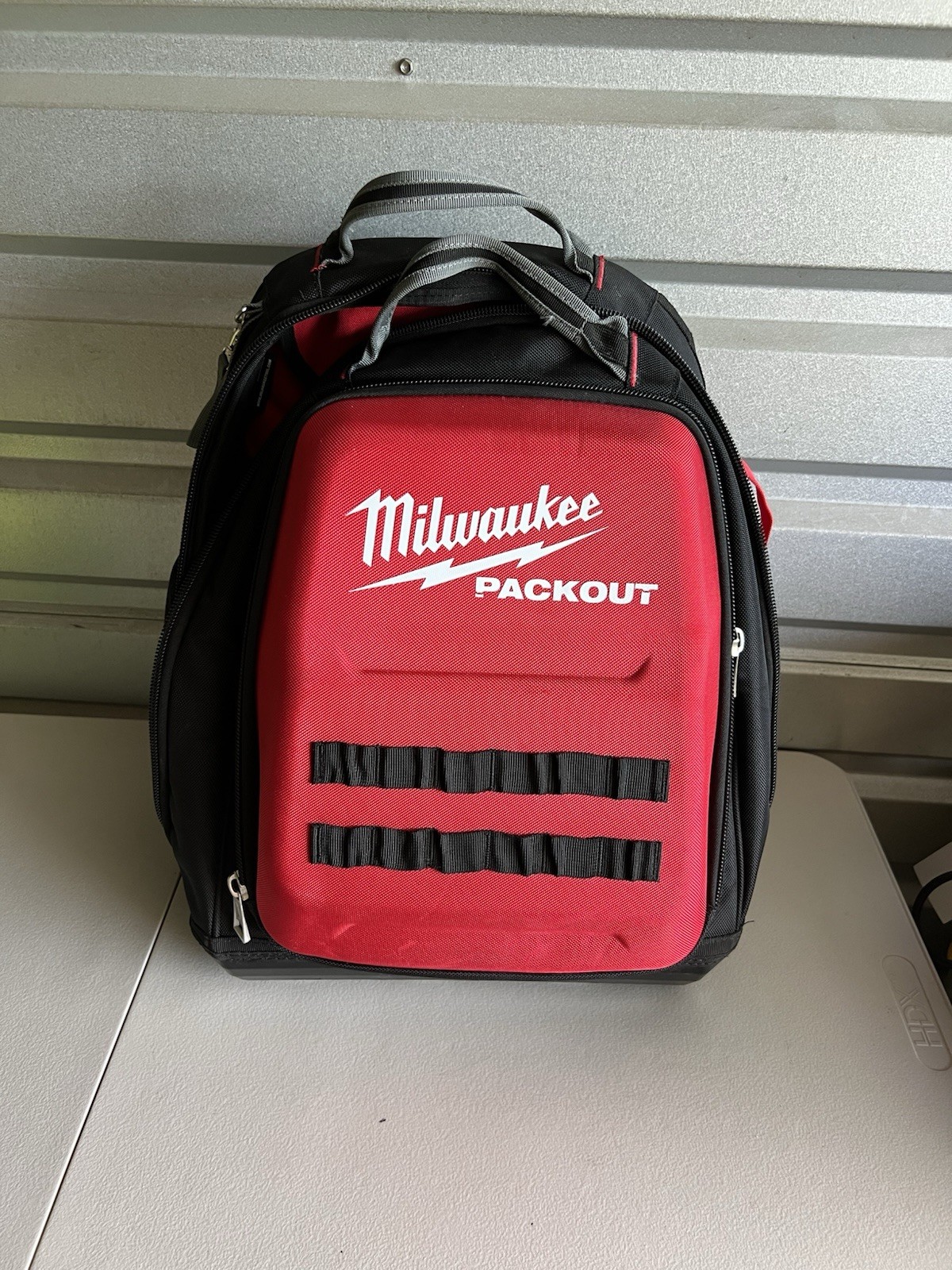 Milwaukee 48-Pocket Tear-Resistant PACKOUT Modular Storage Backpack NEEDS REPAIR