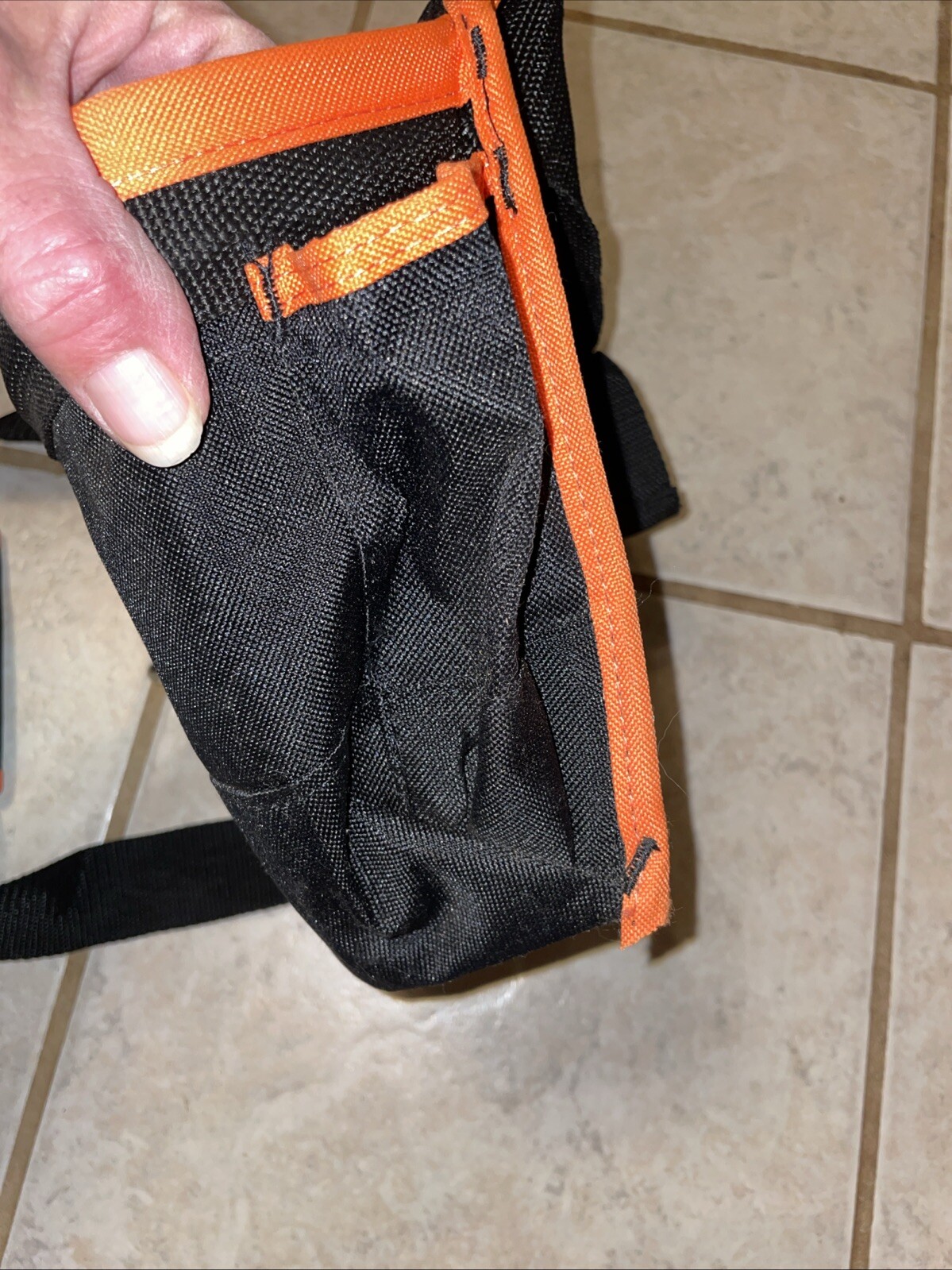 Black and orange removable tool belt with Tape Measure Pocket