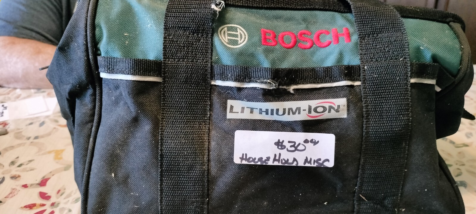 Assorted household items with tool bag.