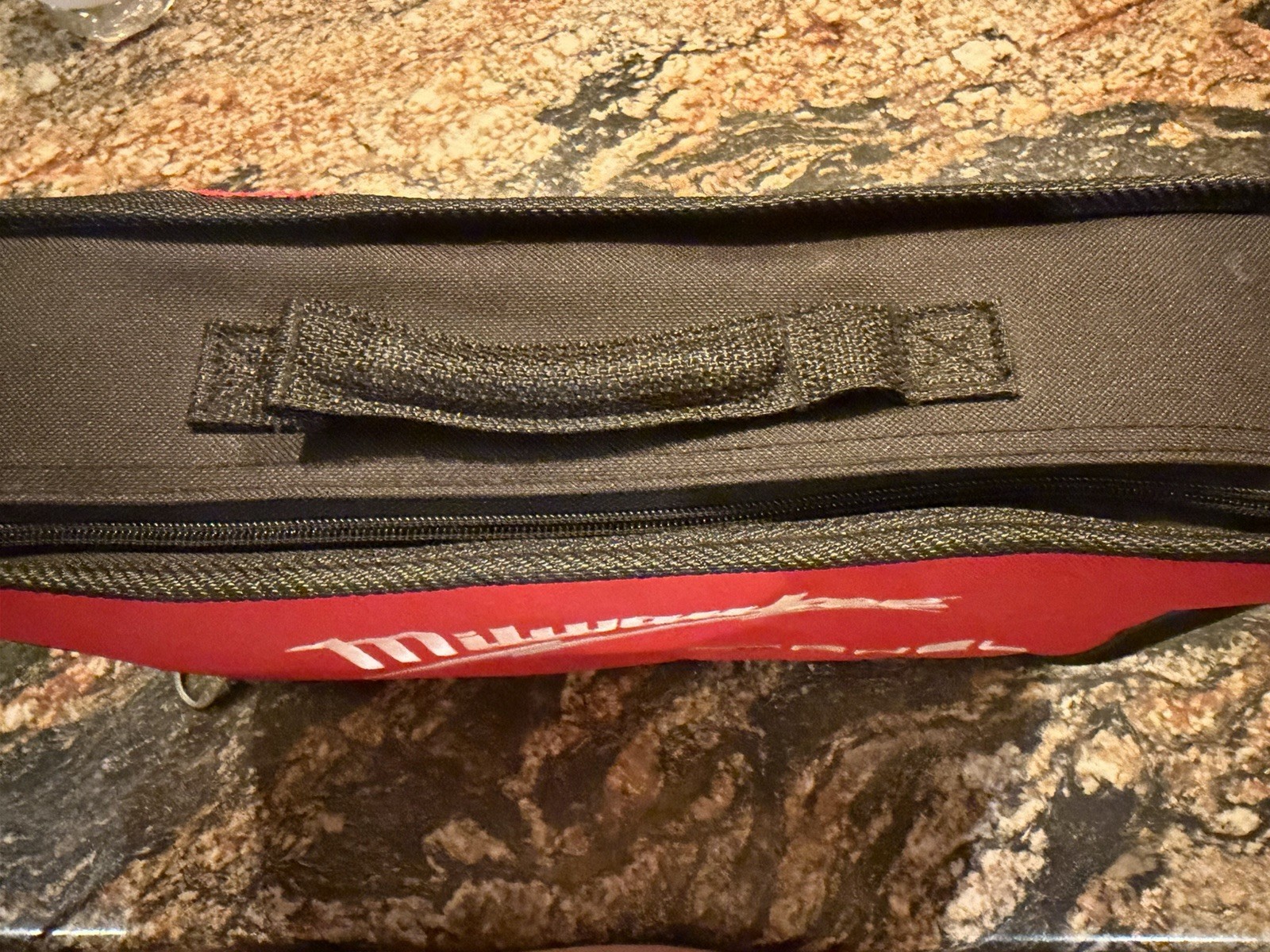 Milwaukee M12 FUEL Small Tool Bag Red/Black Zipper, Handle, Mesh 48-22-8122